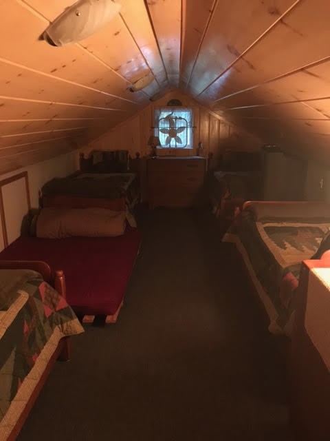 Second floor bedroom. 4 twin beds, 1 futon, full bath