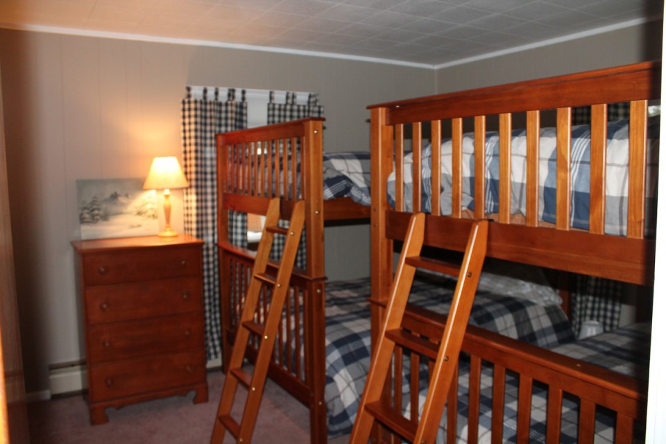 Bunk room with 4 full beds
