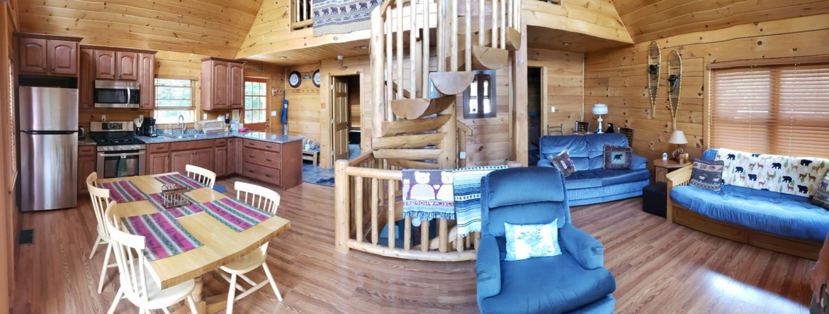 Kitchen, living room, spiral log staircase