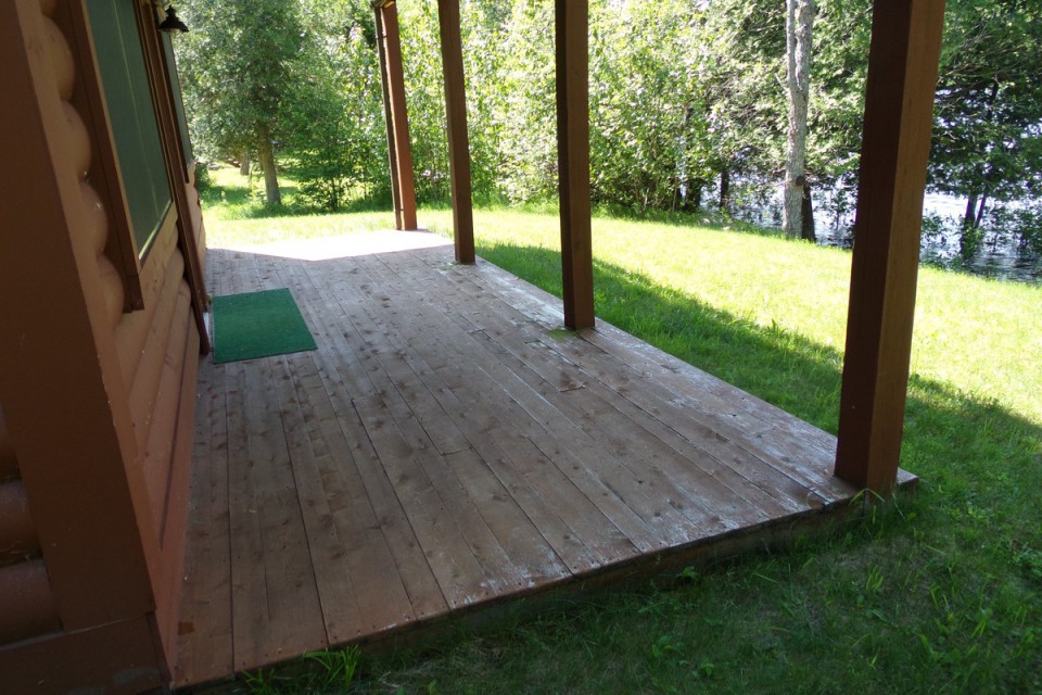 front of cabin w porch