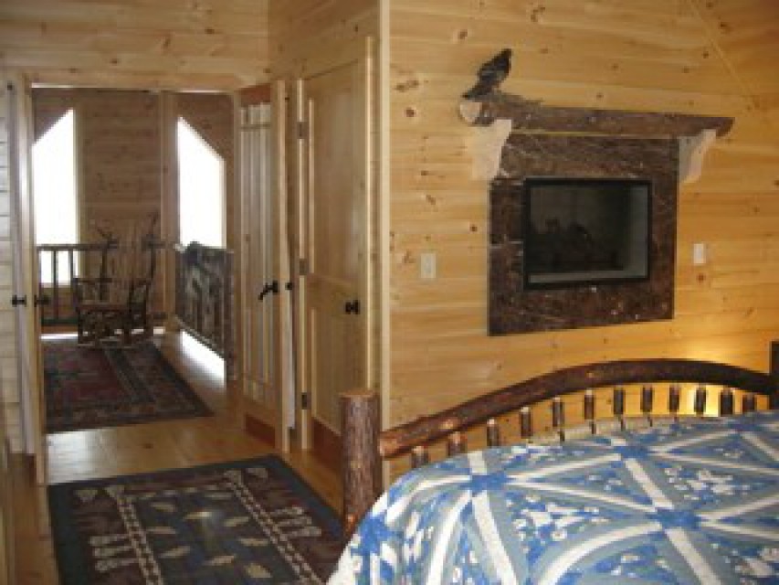 master bedroom suite onto loft area