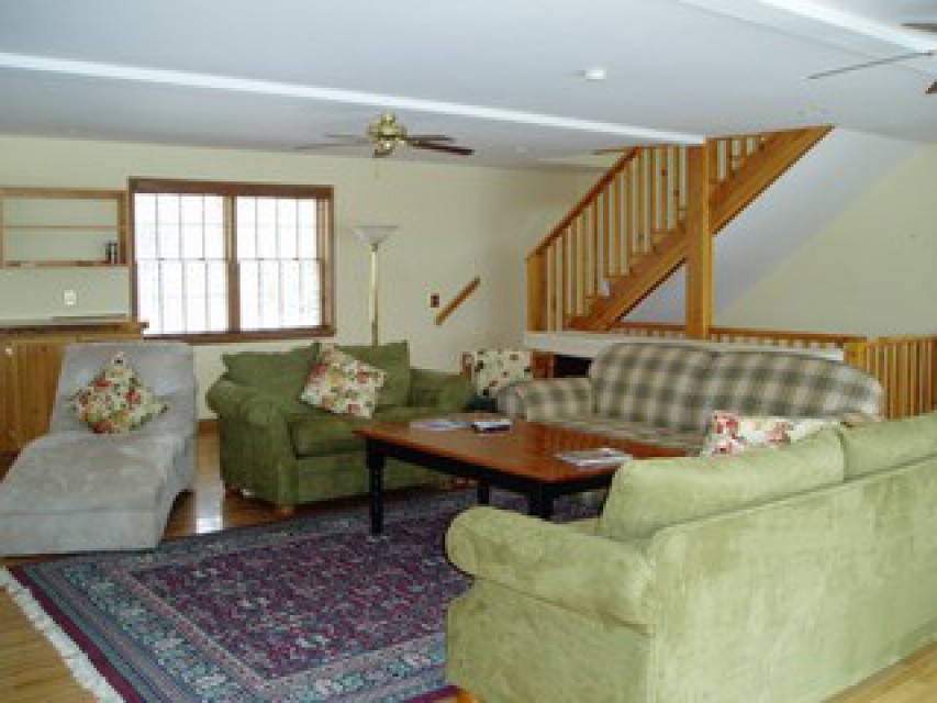Great room w/ open stairs to west end bedroom