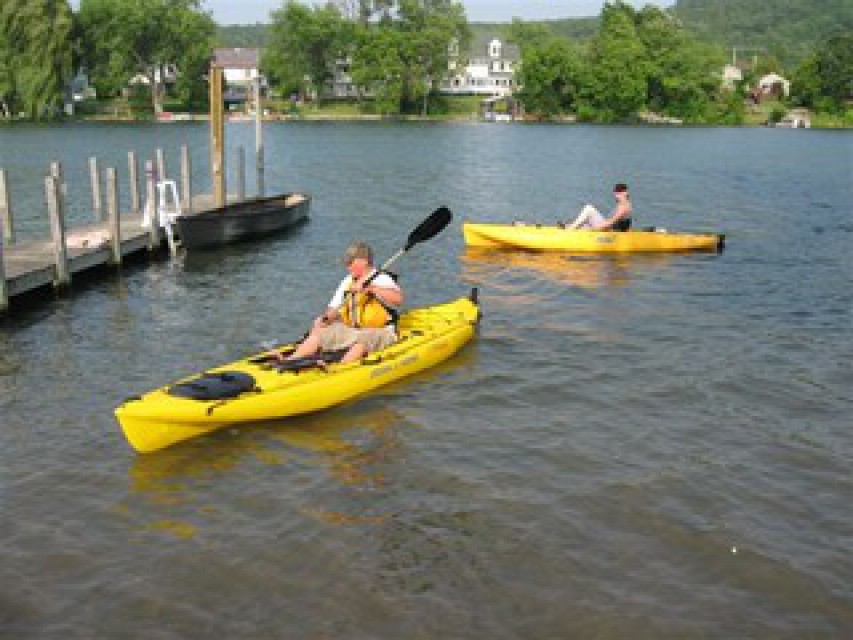 3 kayaks, 2 canoes, row boat and a paddle boat included