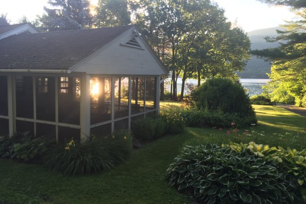 House overlooking lake - morning sunshine