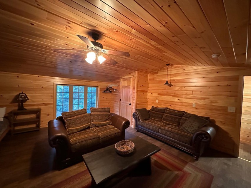 Bunk House Living area with Large window of Moose River