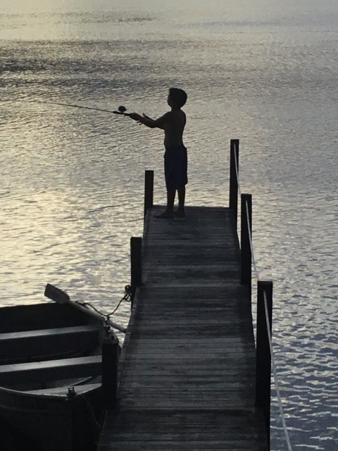Grandson fishing from the dock
