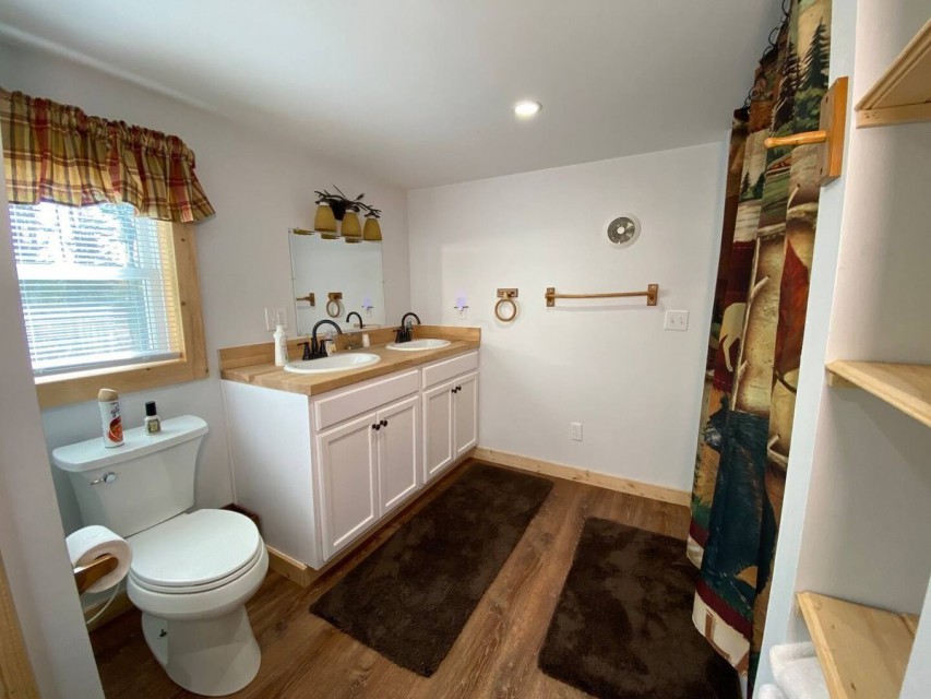 full bathroom with double vanity