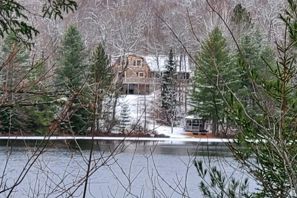 Lodge from opposite shore of Bass Lake