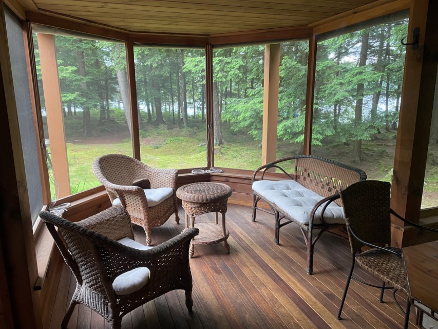 Screened porch, ideal for work or quiet meal
