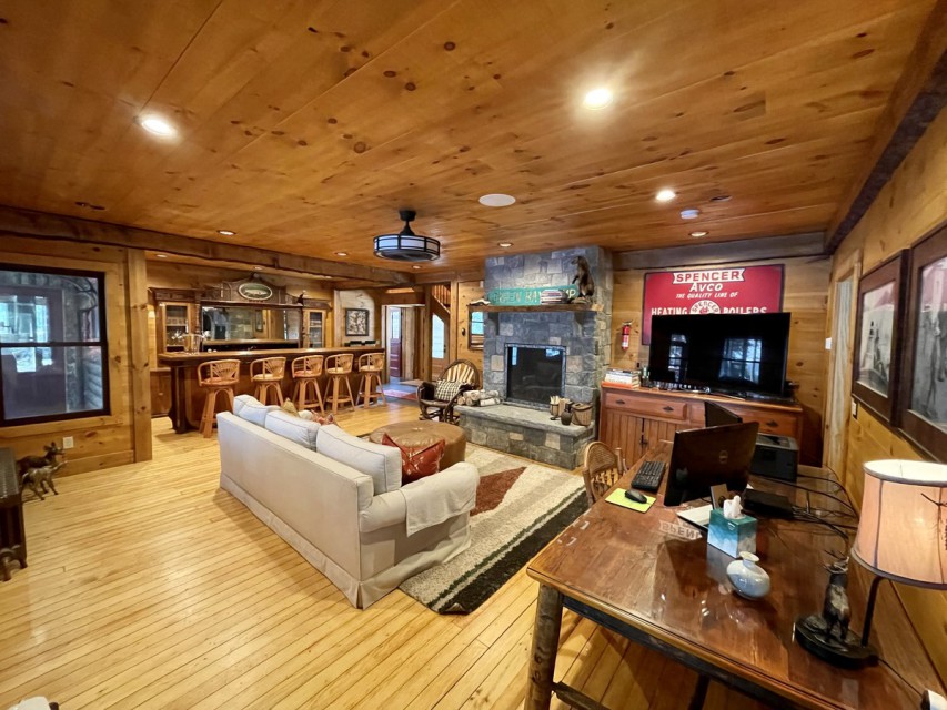 Second family room on main level with Adirondack bar