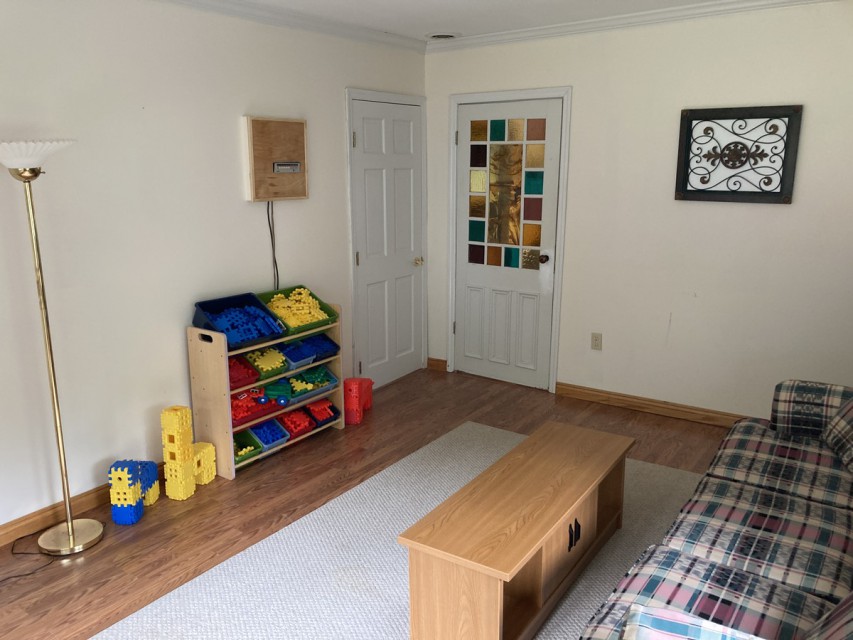 Den with children's toys, pull-out full size sofa, TV