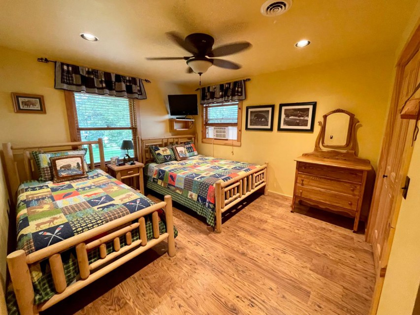 Upstairs bedroom with queen and twin beds, full bath