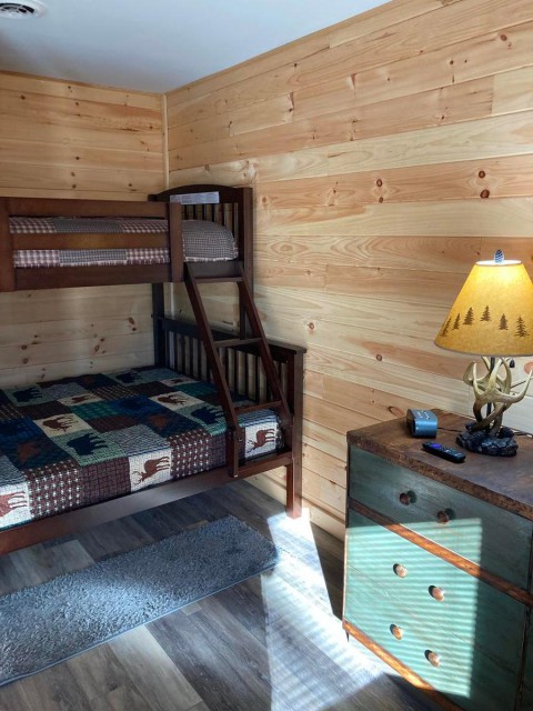 Lower level bedroom with bunk and TV!