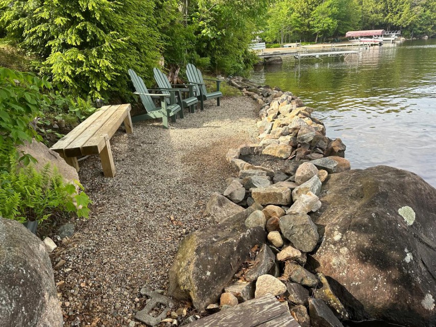 Lakeside fire pit with plenty of seating