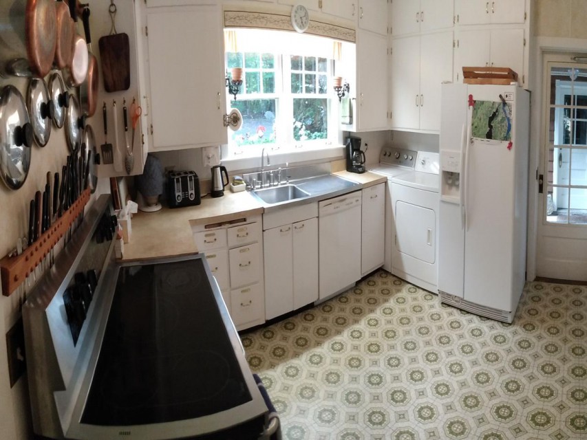 Kitchen with washer & dryer, dishwasher, oven & stove