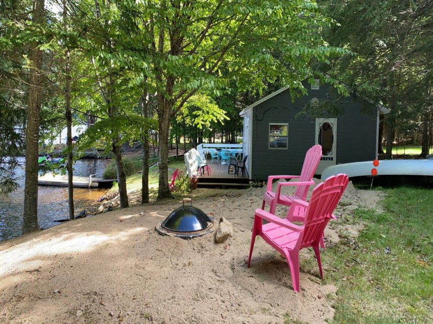 View of side yard with firepit