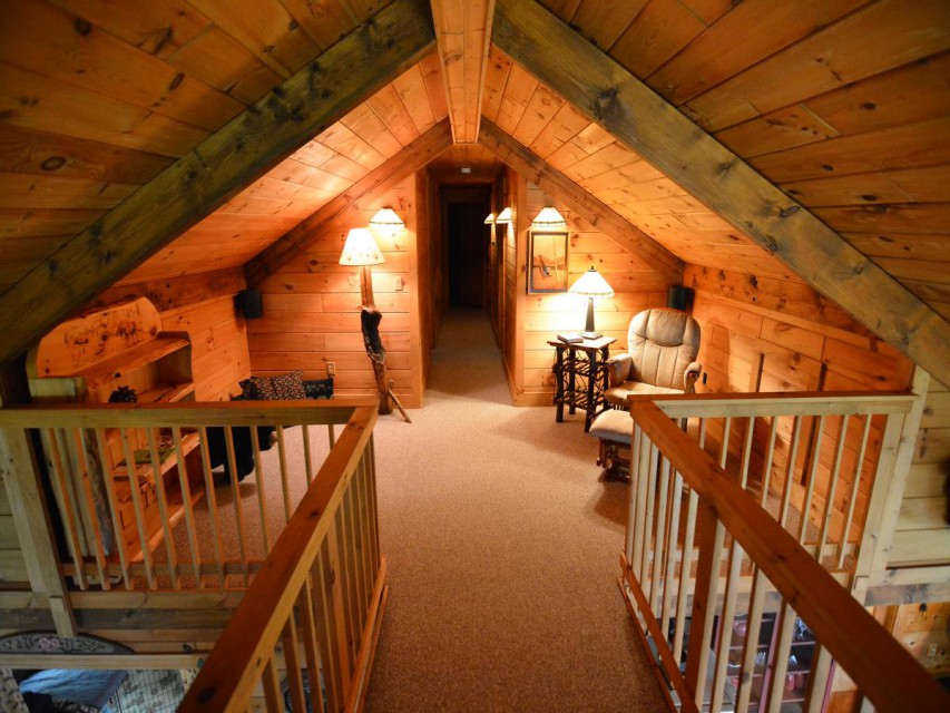 View of loft area leading to upstairs bedrooms