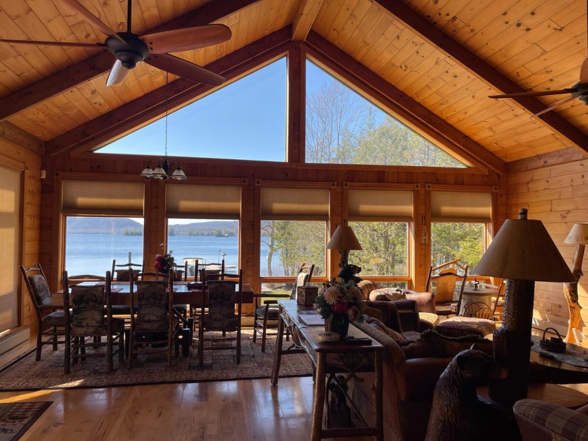 View of Fourth Lake and living room and dining area