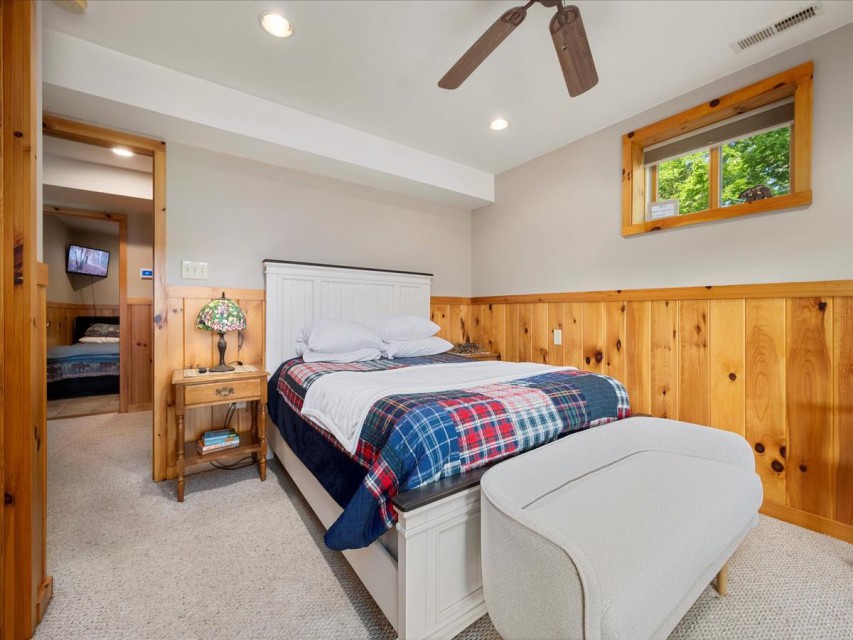 Lower level main bedroom with queen bed