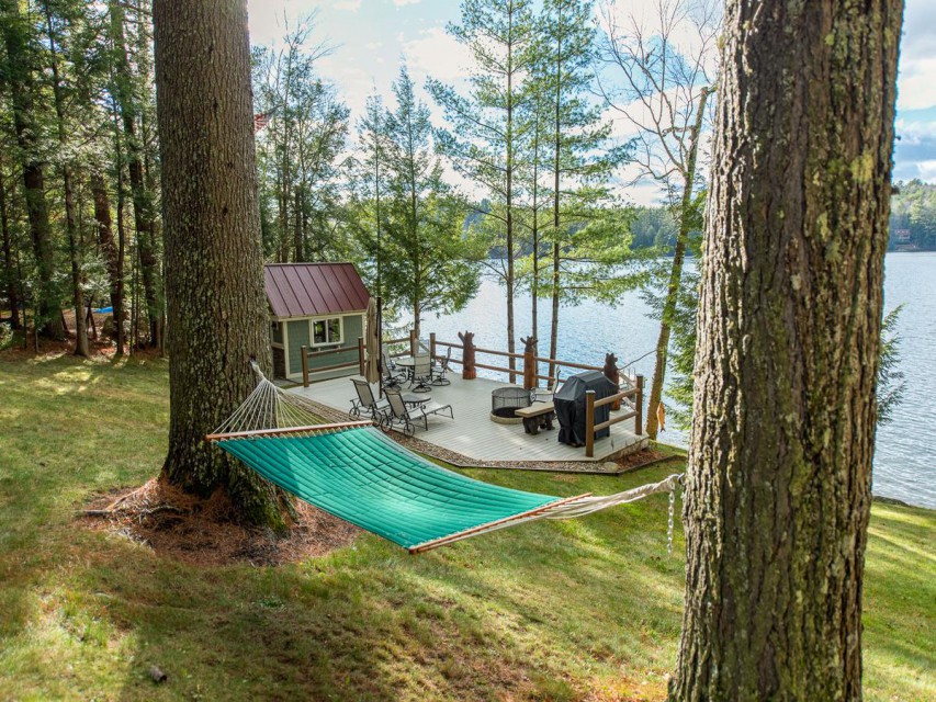 Relax lakeside in a hammock or lounge on the deck