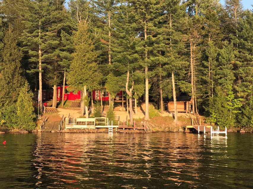 106' of lakefront with staircase, docks, & lean-to