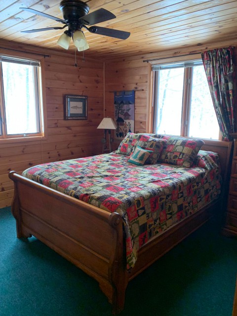 2nd bedroom on main floor with queen bed