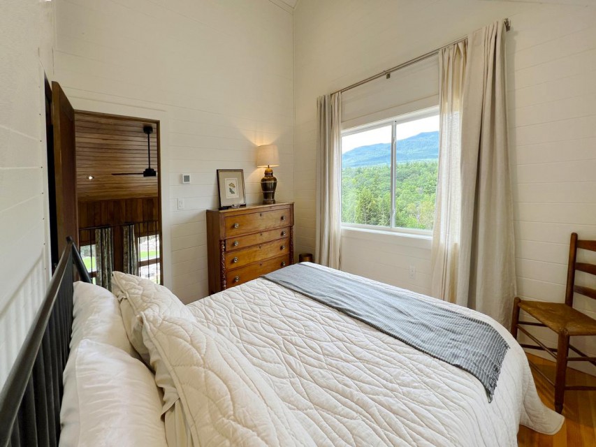 2nd floor bedroom with king bed and views.