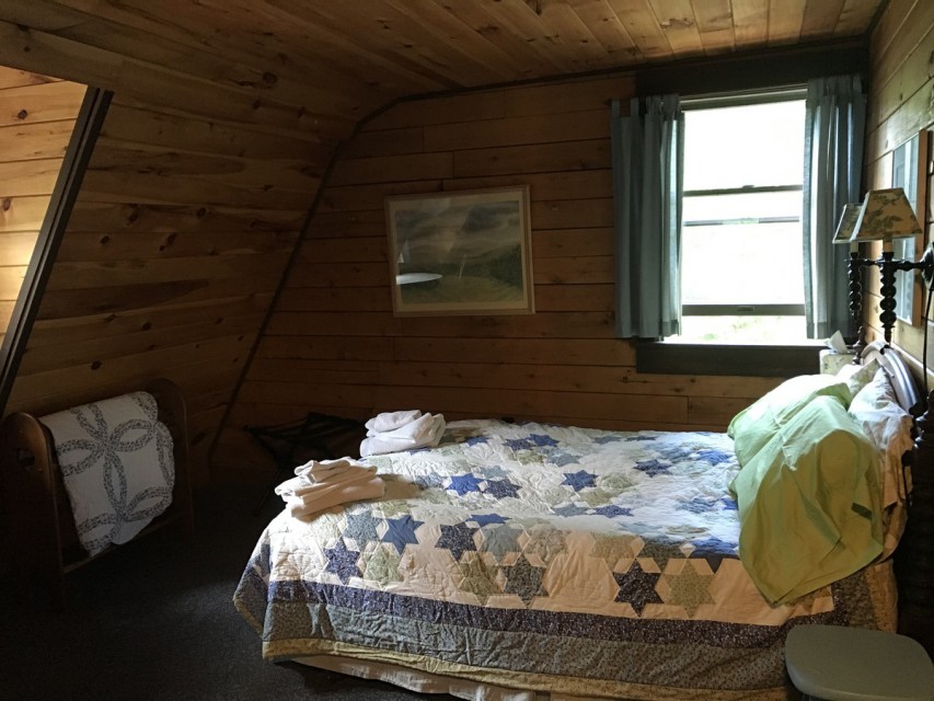 Upstairs room, Queen bed, reading area w/river view