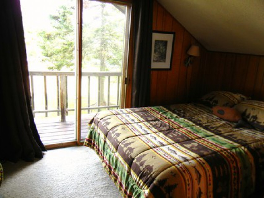 Upstairs bedroom #1 with queen-size bed shown