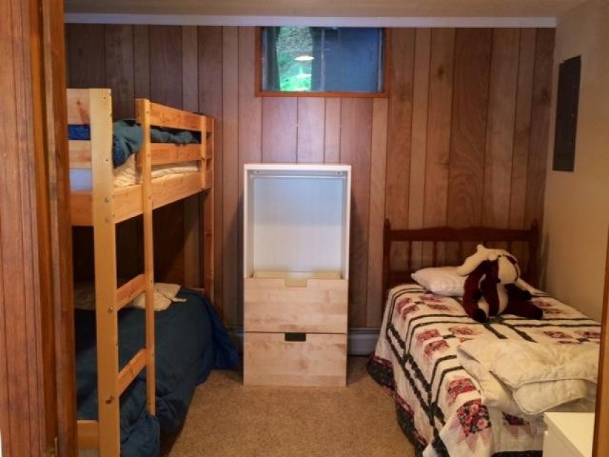 Bedroom #3 (downstairs) with twin bed and bunk beds