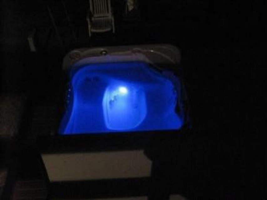 Lighted hot tub at night