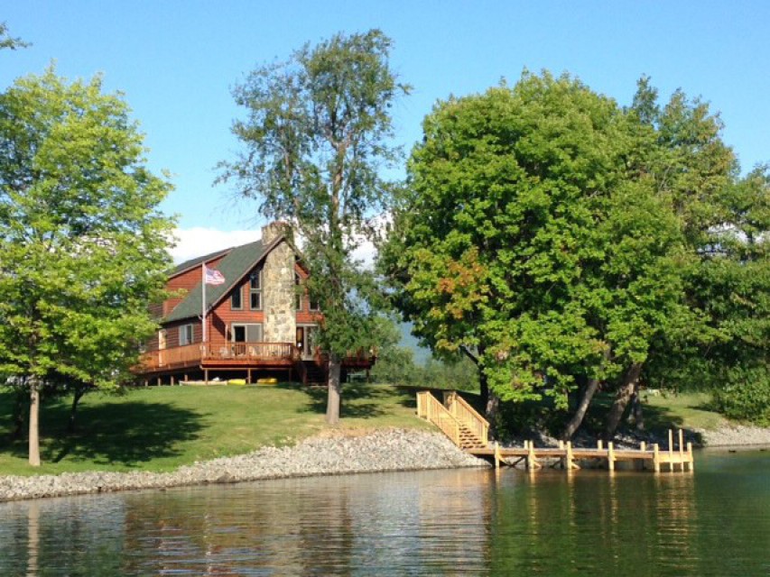 House from the lake, showing our dock
