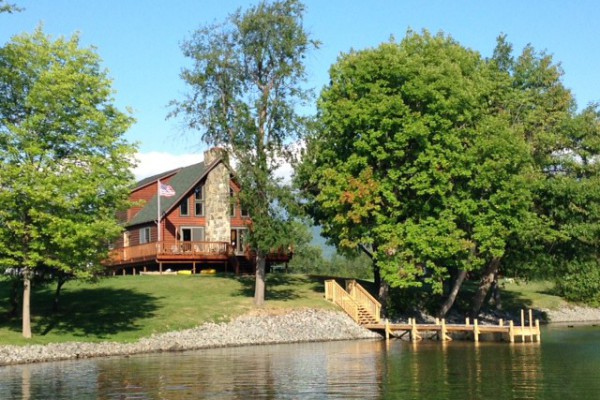 House from the lake, showing our dock