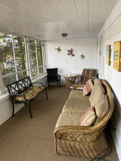 Screened in porch overlooking the lake