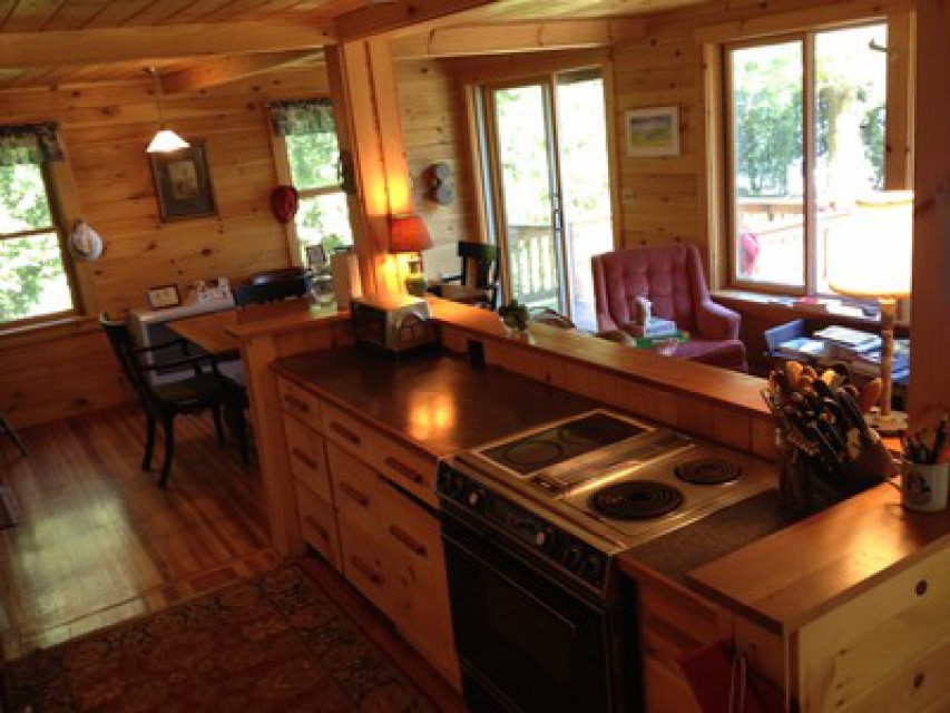 Full size open galley kitchen with lake views