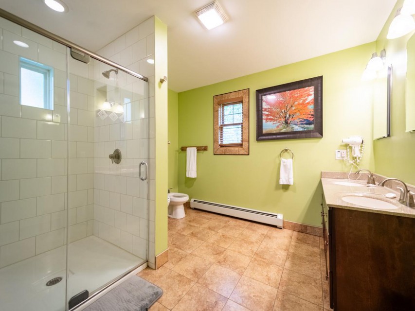 2nd floor master bath, custom tile shower, dual sink.