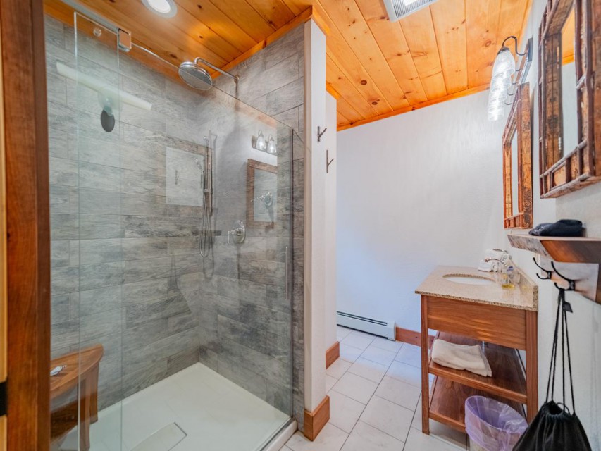 All bathrooms are custom tiled, 1 bathroom has a tub.