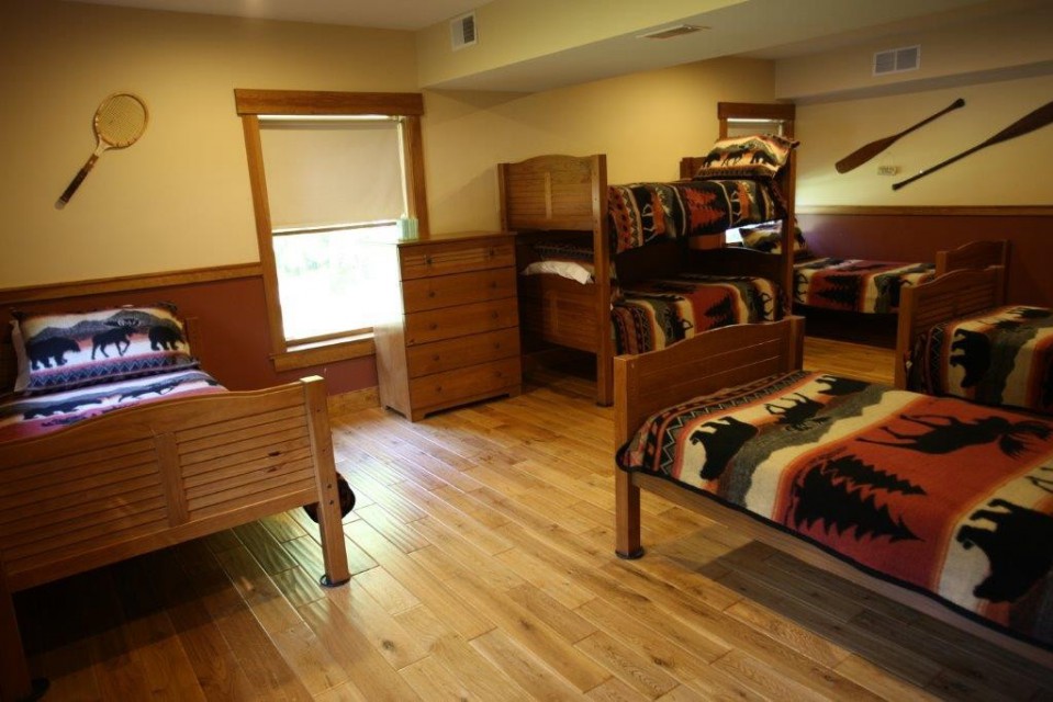 Bunk room with six twin beds and its own bathroom