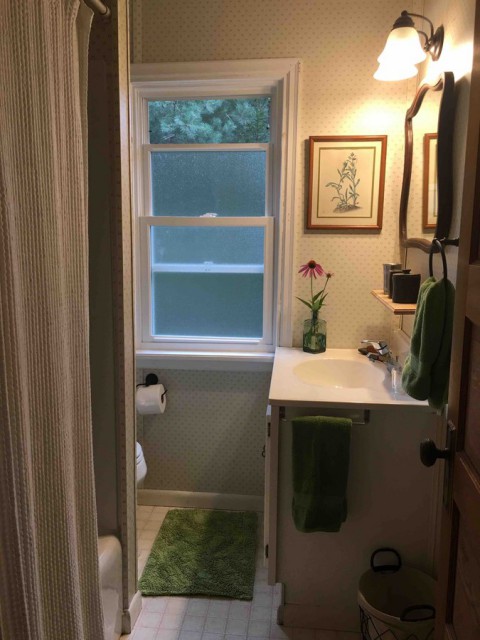Bathroom from hall; bathtub shower