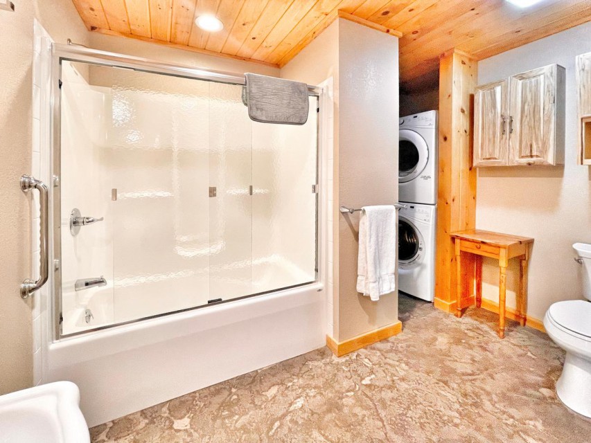 Main floor bathroom with tub/shower & washer/dryer.