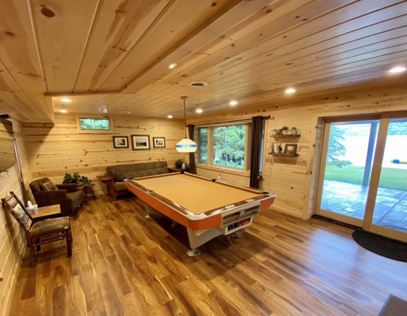 Pool room with lakeview downstairs game room area