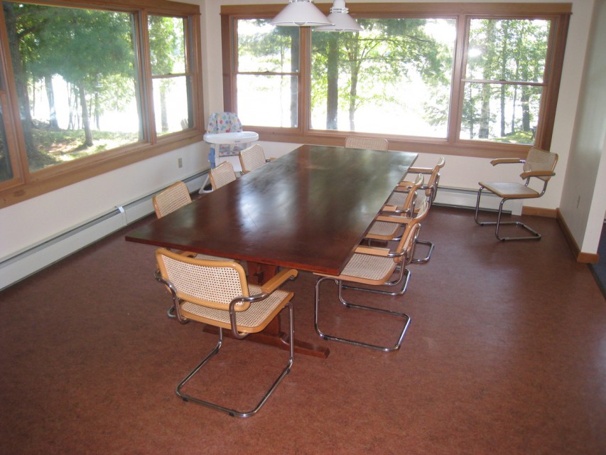 Dining room seats 10-12 with lake view.