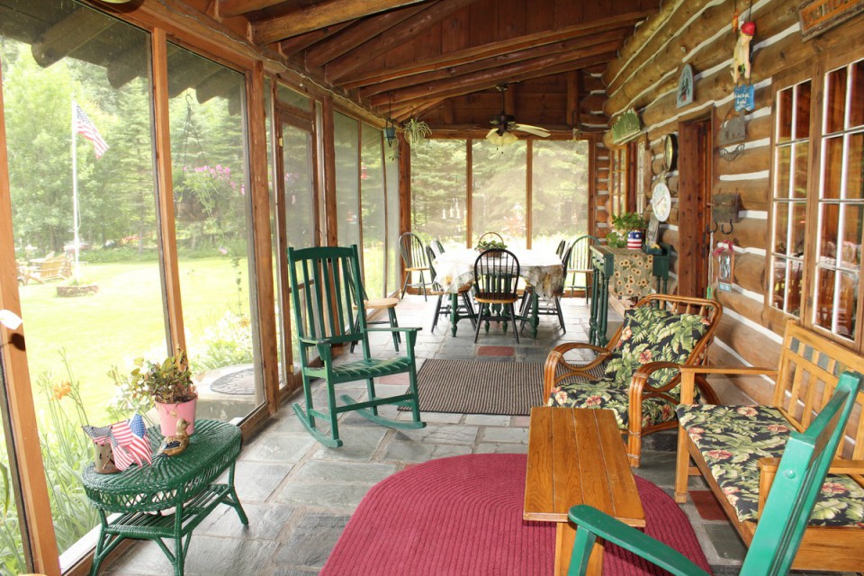 Screened in Porch with Seating for 12 plus Sitting Area