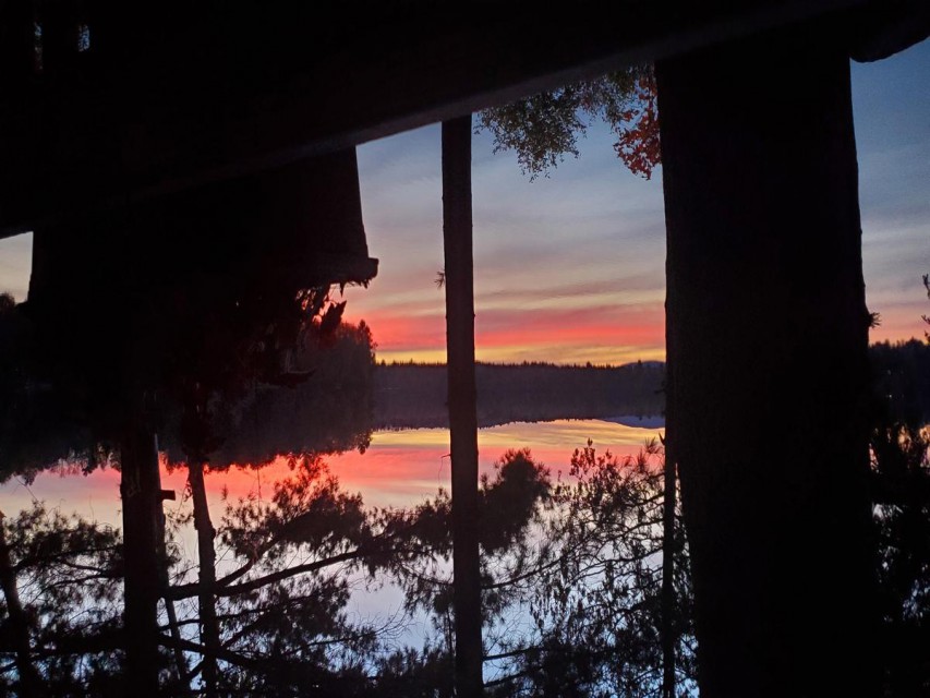 Western sunset across Little Wolf Lake